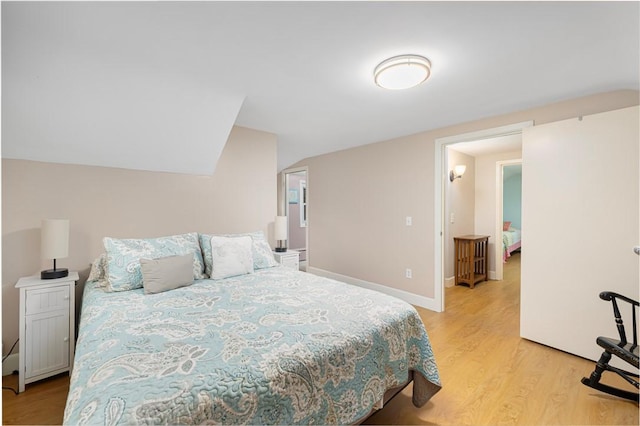 bedroom featuring light wood-type flooring