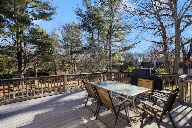 wooden deck featuring grilling area