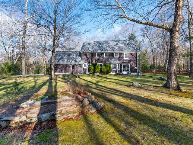 view of front of house with a front yard