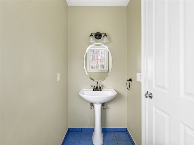 bathroom with tile patterned floors