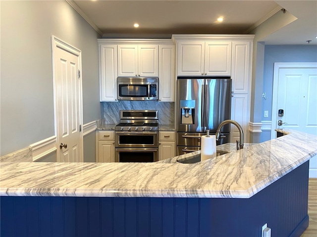 kitchen with stainless steel appliances and light stone countertops