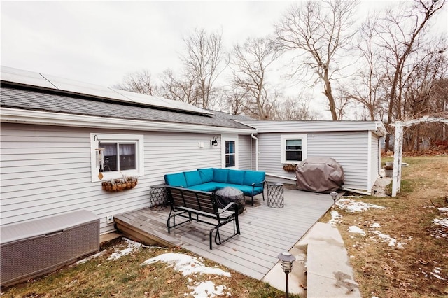 deck featuring an outdoor hangout area and a grill