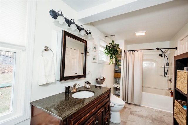 full bathroom with toilet, a healthy amount of sunlight, shower / tub combo with curtain, and vanity