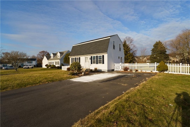 view of front of house with a front lawn