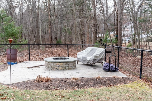 view of patio featuring a fire pit and grilling area