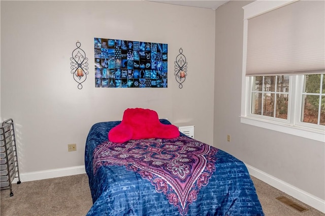 bedroom featuring carpet