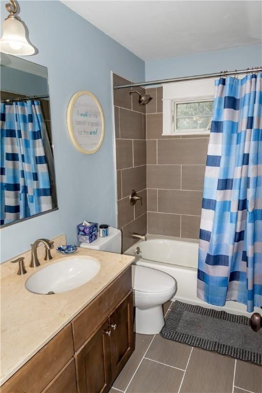 full bathroom featuring toilet, shower / tub combo, and vanity