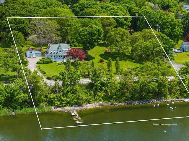 1660 Main Rd, Tiverton, RI 02878 - aerial view of property and surrounding area featuring property boundaries highlighted, a large body of water, and a heavily wooded area
