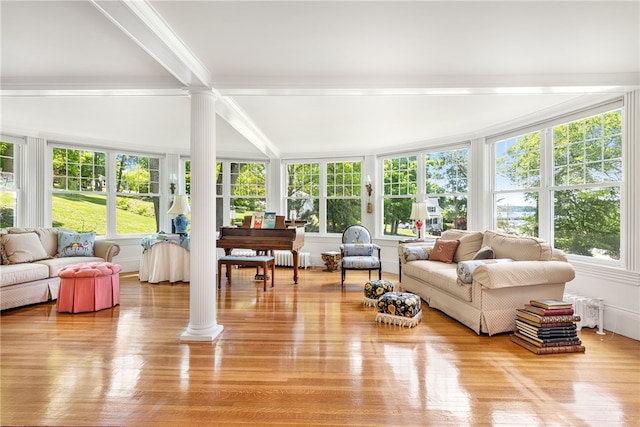 sunroom featuring ornate columns