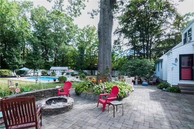 view of patio / terrace featuring a fire pit