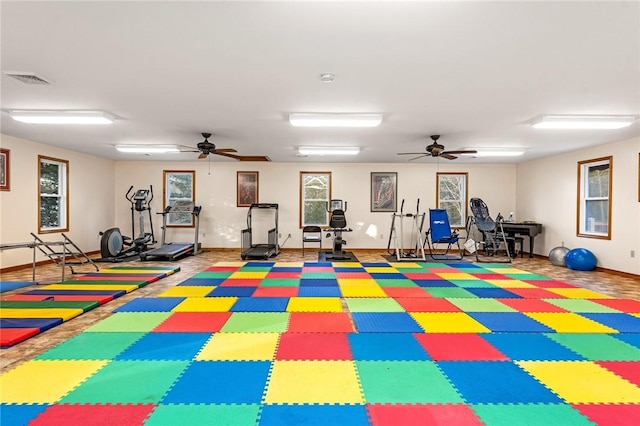 workout area with ceiling fan