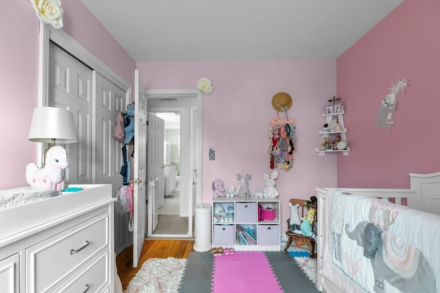 bedroom featuring light wood-style floors