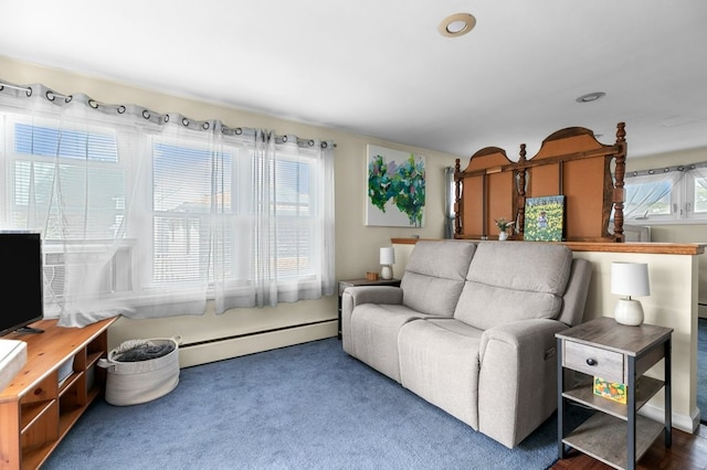 carpeted living room featuring a baseboard radiator