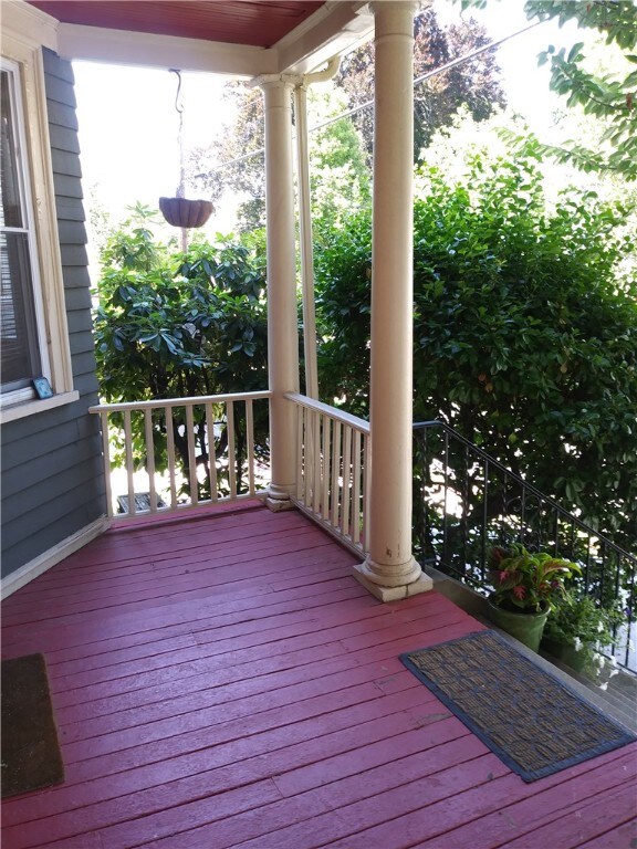 wooden deck featuring covered porch