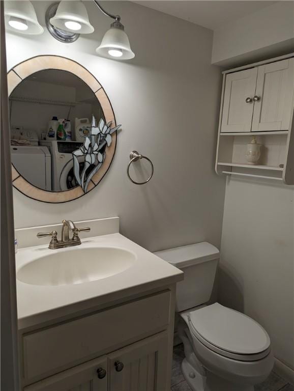 bathroom with vanity and toilet