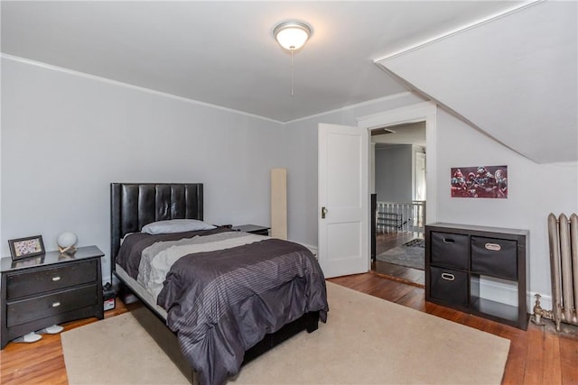 bedroom featuring hardwood / wood-style floors