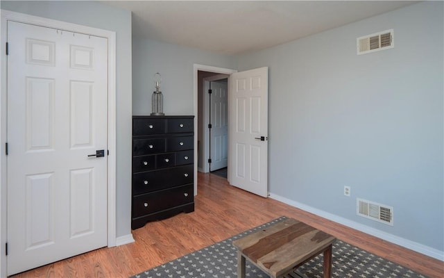 bedroom featuring hardwood / wood-style flooring