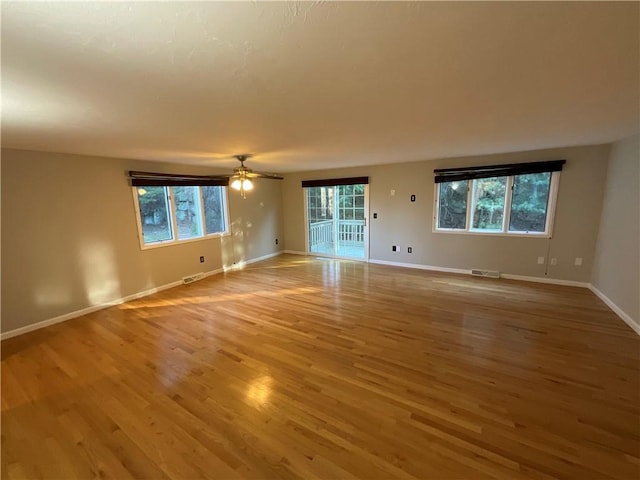 interior space featuring ceiling fan and light wood-type flooring