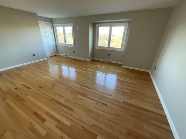 empty room featuring light hardwood / wood-style floors