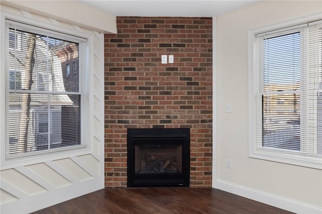 details featuring a fireplace and hardwood / wood-style floors