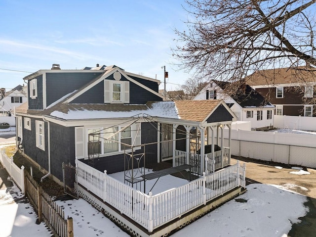 view of snow covered property