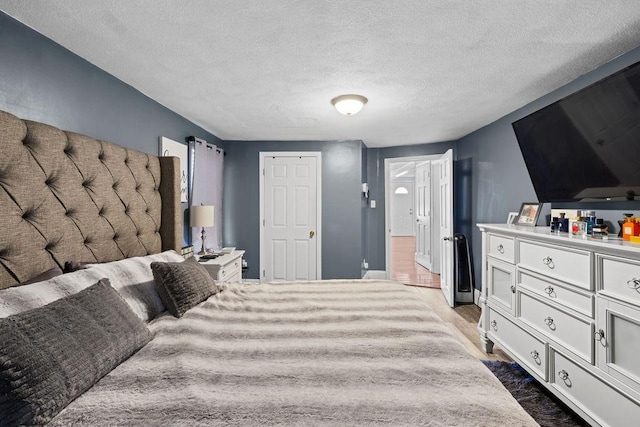 bedroom featuring a textured ceiling