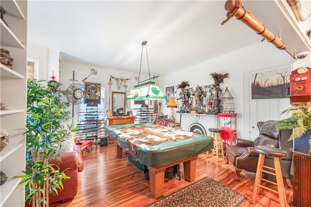 playroom with hardwood / wood-style flooring and billiards