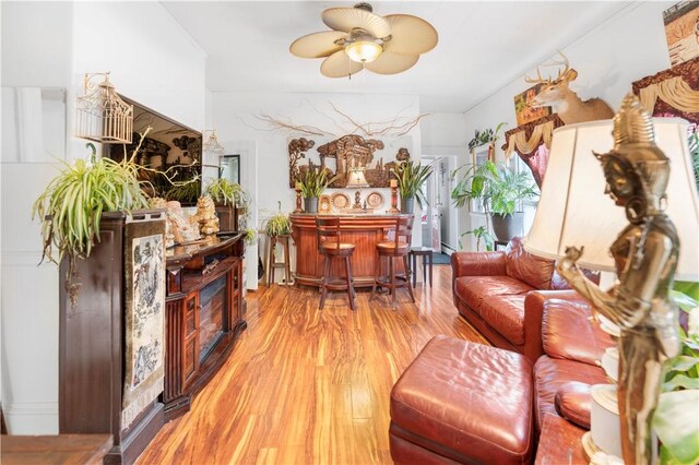 interior space with ceiling fan and light wood-type flooring