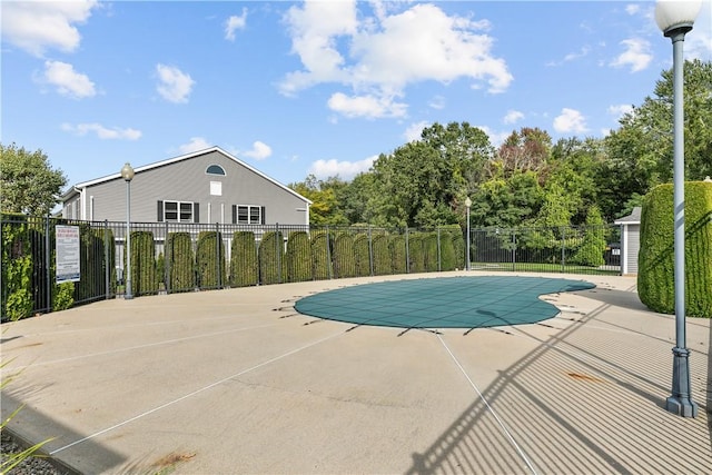 view of swimming pool featuring a patio