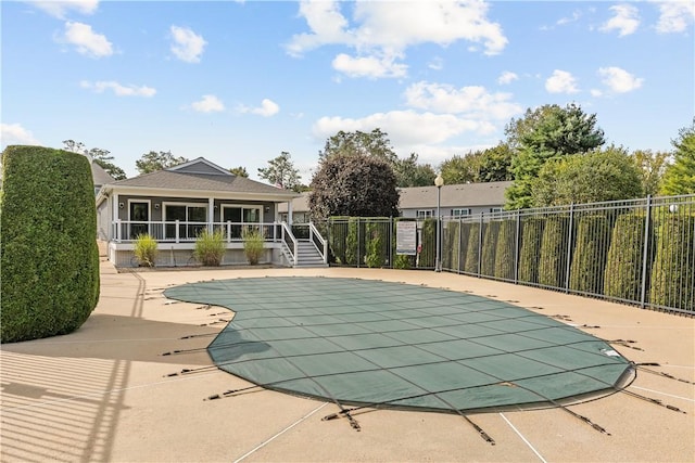 view of swimming pool featuring a patio