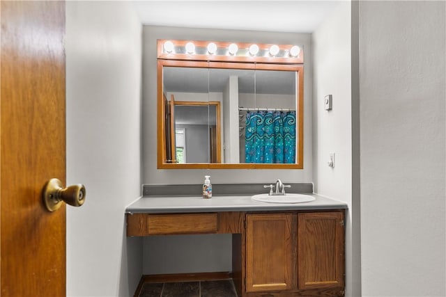 bathroom featuring vanity and tile patterned flooring