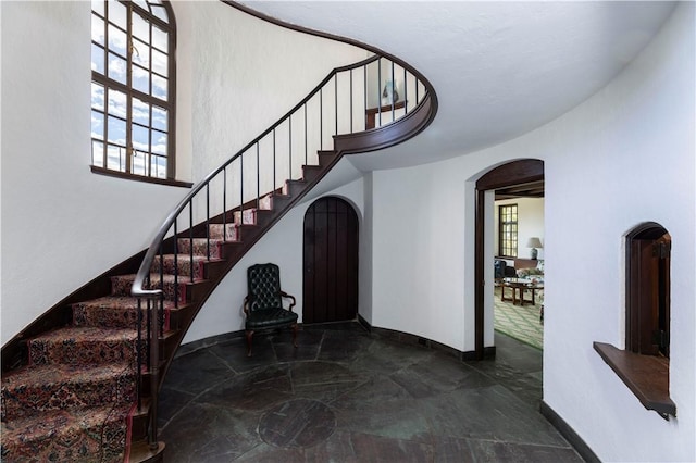 foyer featuring a high ceiling