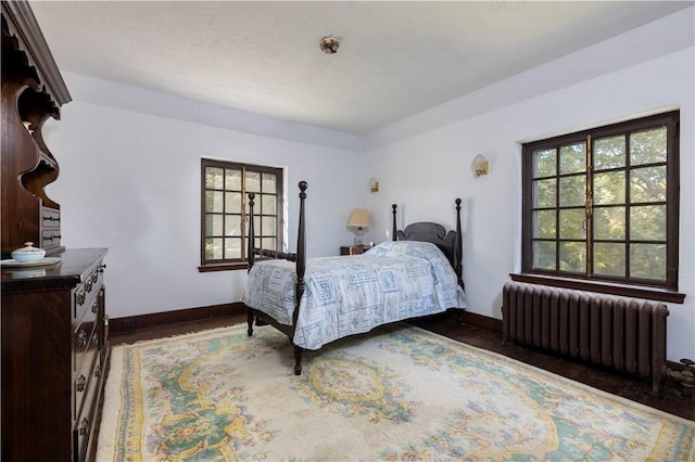 bedroom with radiator heating unit