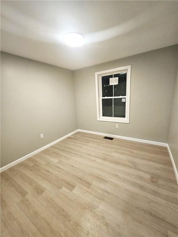 empty room featuring light wood-type flooring