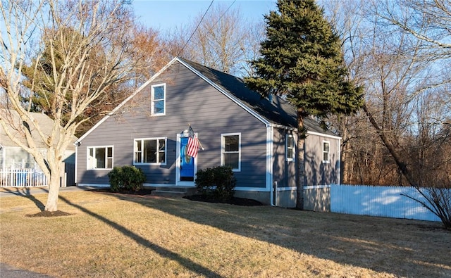 view of front of home with a front yard