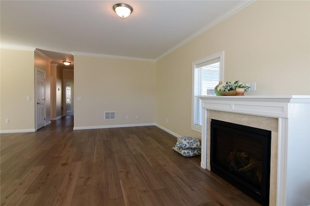 unfurnished living room featuring dark hardwood / wood-style flooring, a fireplace, and ornamental molding