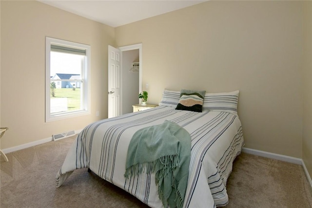 bedroom featuring carpet flooring