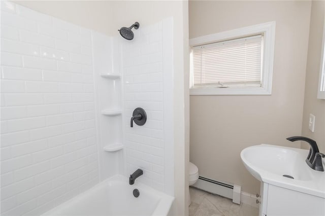 full bathroom featuring washtub / shower combination, toilet, sink, and a baseboard radiator