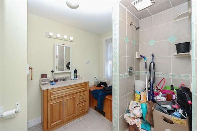 bathroom featuring tile patterned floors and vanity