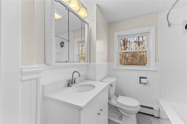 full bathroom featuring a baseboard radiator, tiled shower / bath combo, tile patterned flooring, vanity, and toilet