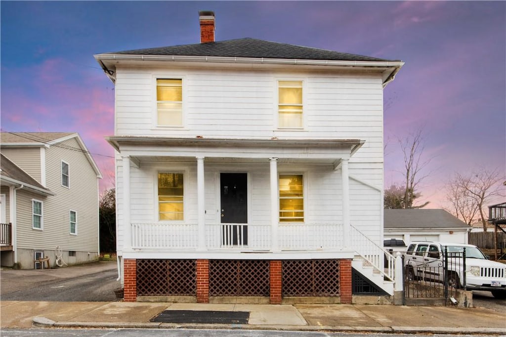 view of front of home featuring covered porch