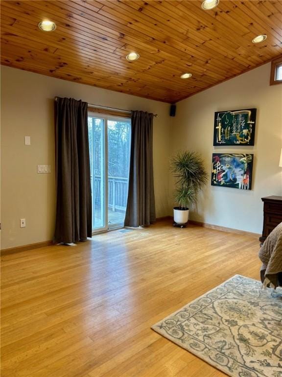 sitting room featuring vaulted ceiling, wooden ceiling, and light hardwood / wood-style floors