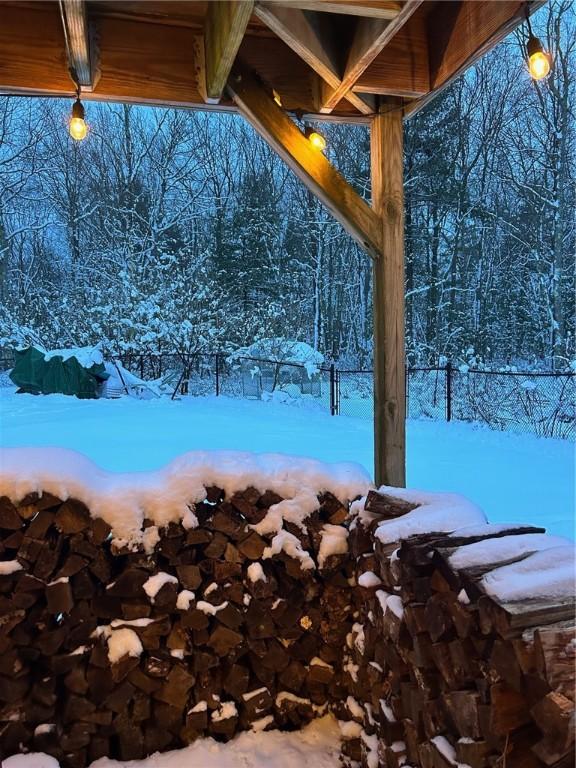 view of yard layered in snow