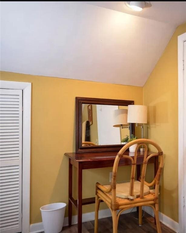 living area with lofted ceiling