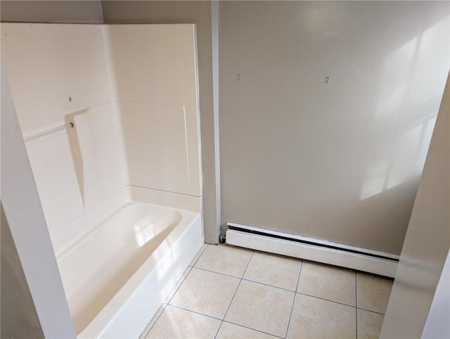 bathroom featuring a baseboard radiator and tile patterned floors