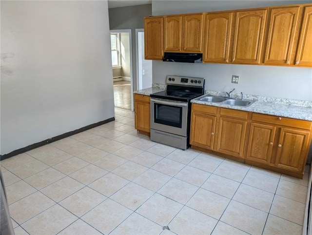 kitchen with light stone countertops, sink, stainless steel electric range, and light tile patterned floors