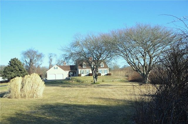 view of yard featuring a garage