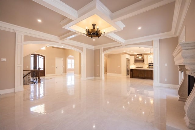 unfurnished living room with beam ceiling, ornamental molding, a chandelier, and coffered ceiling