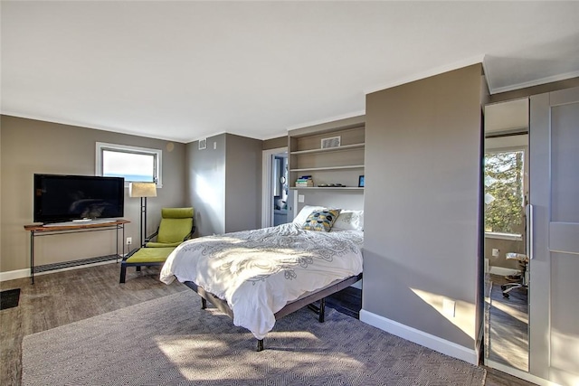 bedroom with crown molding