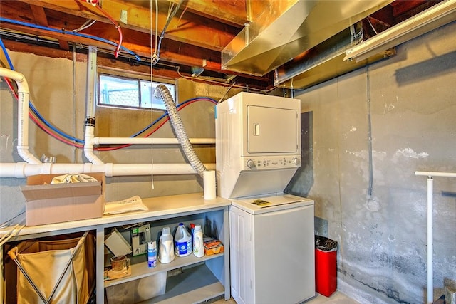 washroom featuring stacked washer and dryer